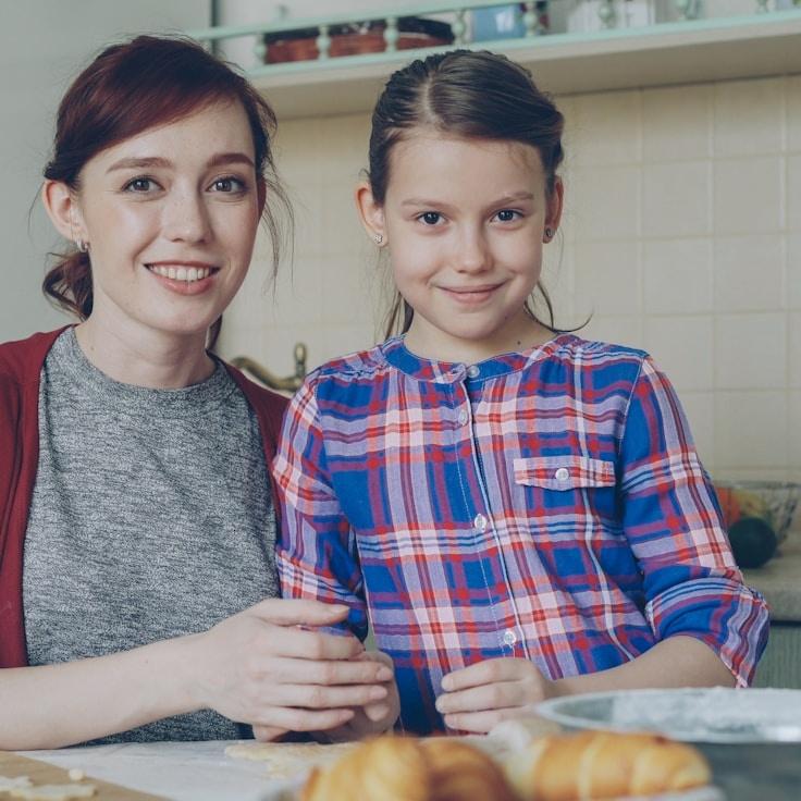 Avery Lin, Lead Design Curator at IvyBoxMap, reviewing corporate floral arrangements